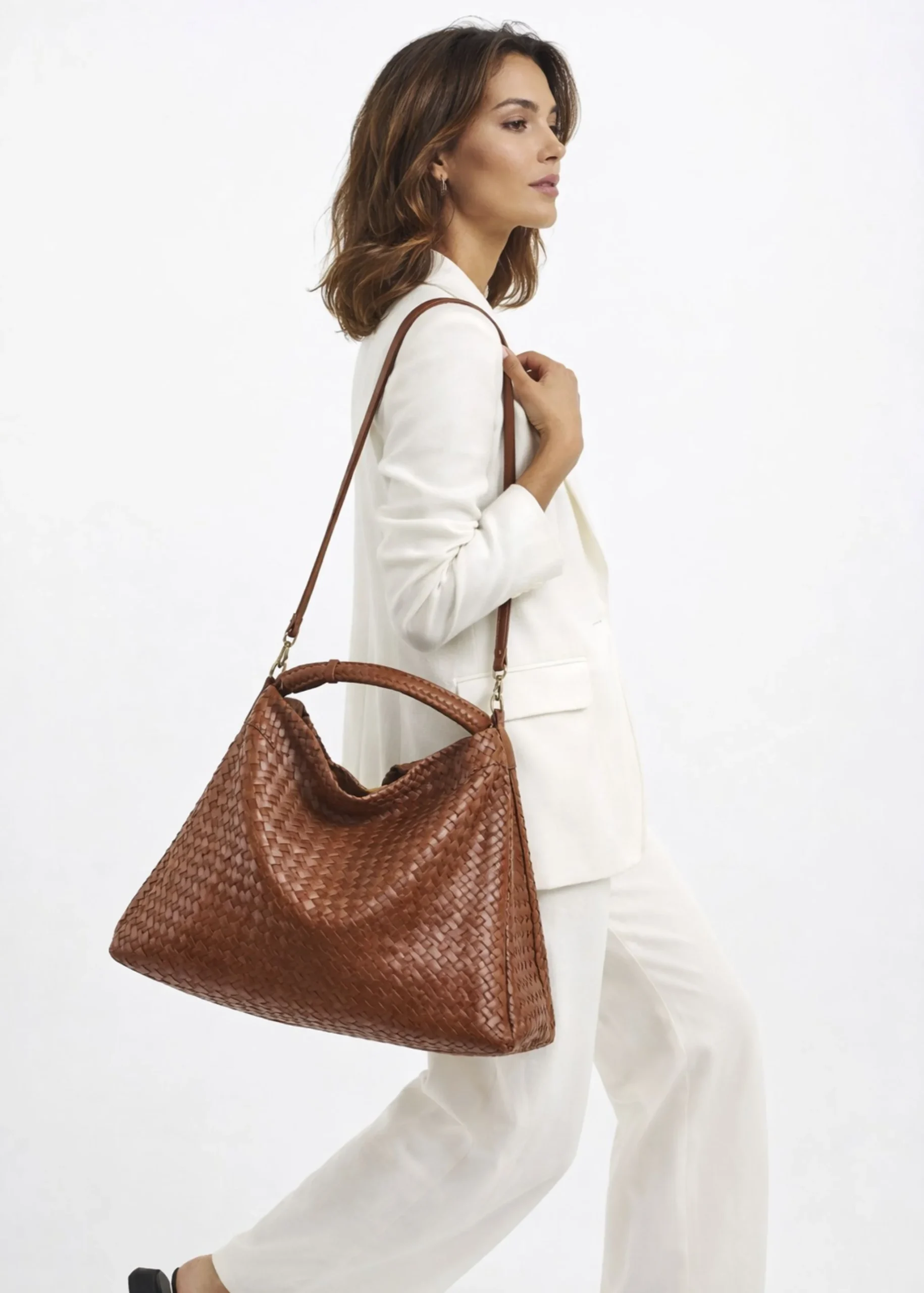 womens-brown-leather-woven-bag.webp