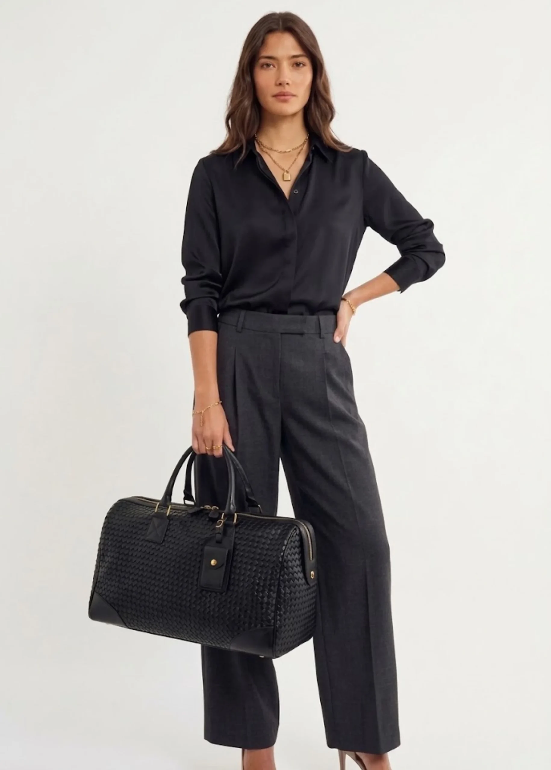 black-woven-leather-weekender-bag.webp