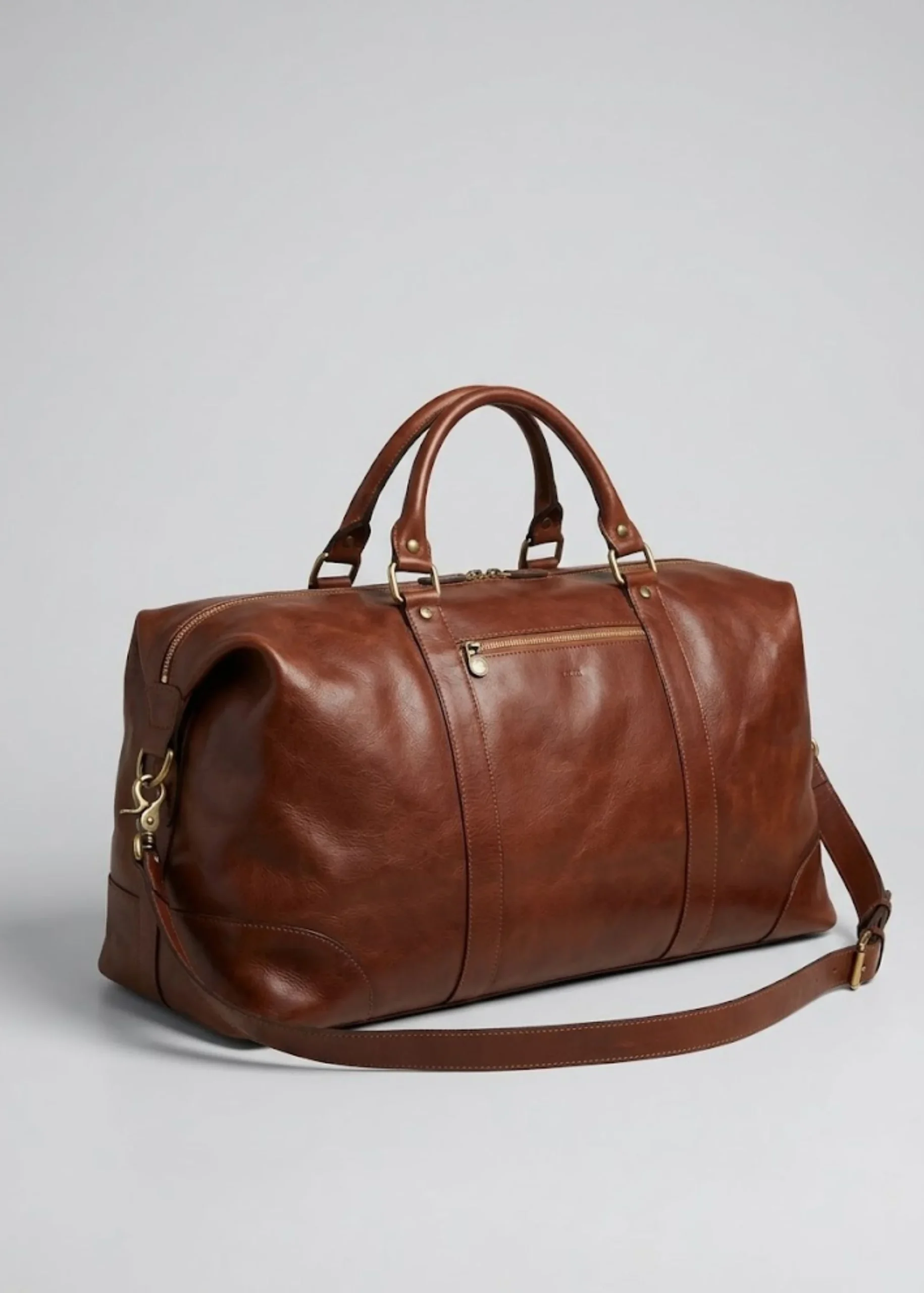brown-leather-travel-shoulder-bag.webp
