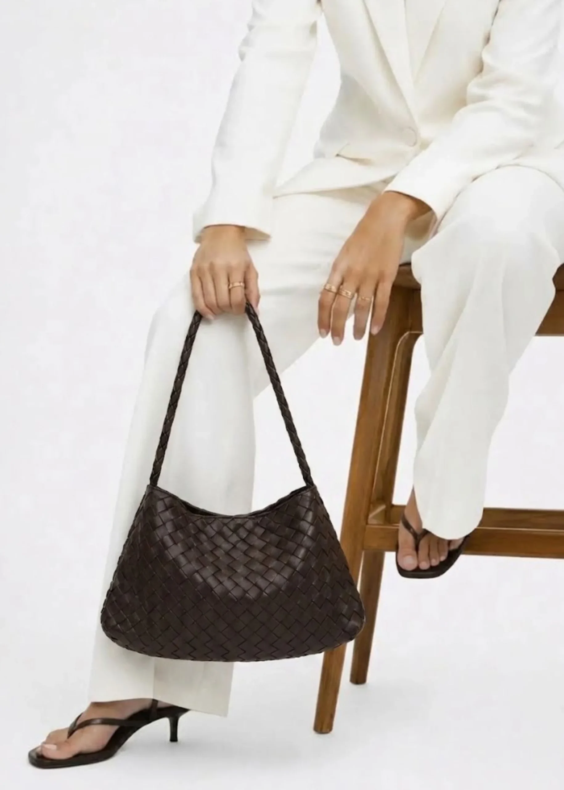 brown-woven-leather-dumpling-purse.webp