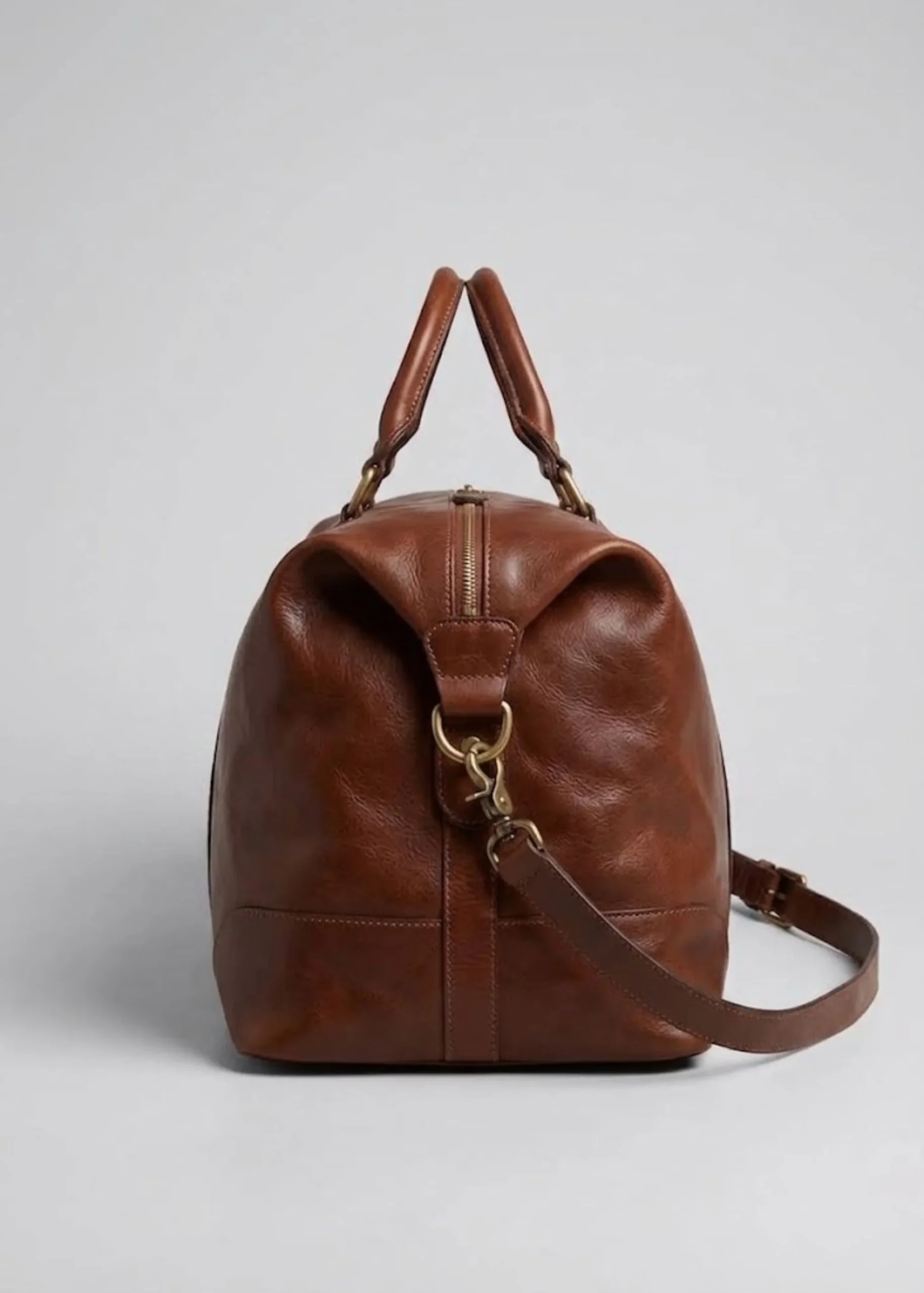travel-leather-brown-shoulder-bag.webp